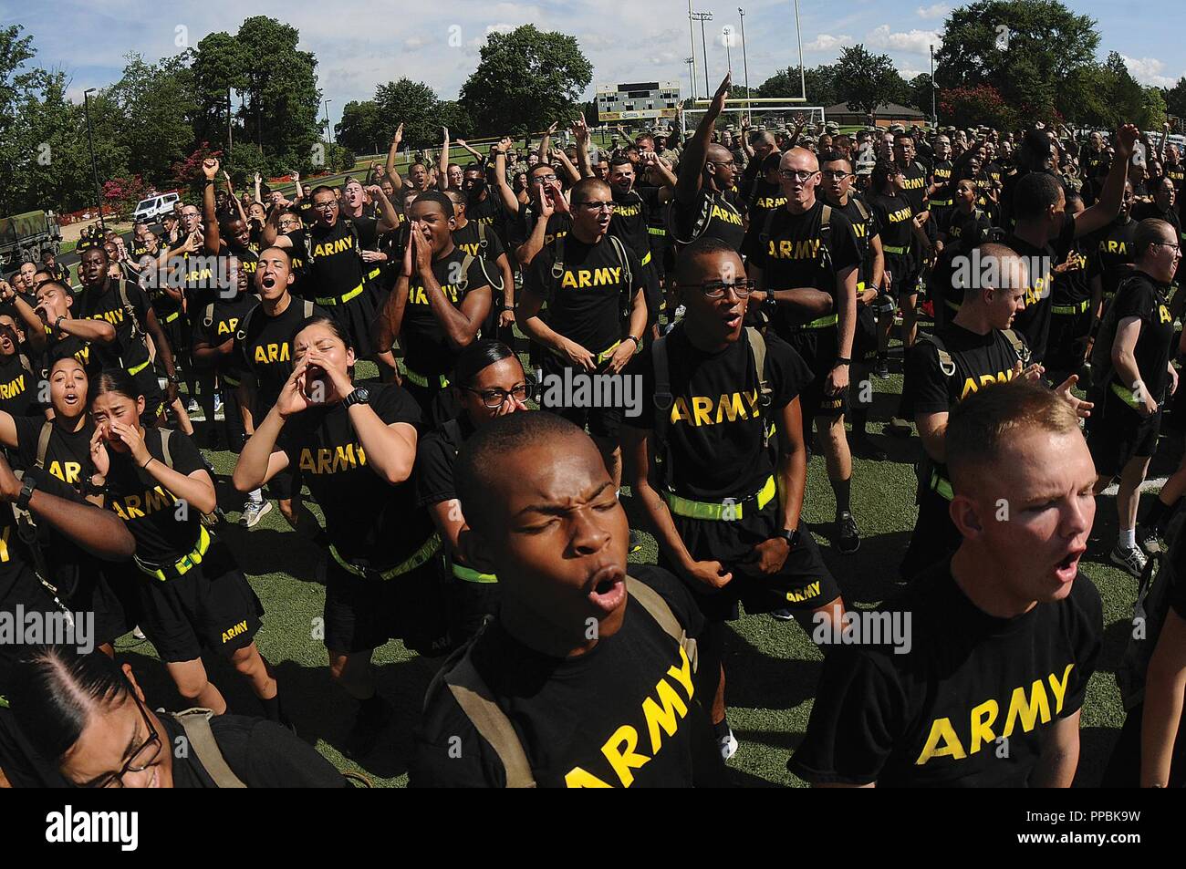 Soldiers cheer on their units during the 23rd Quartermaster Brigade