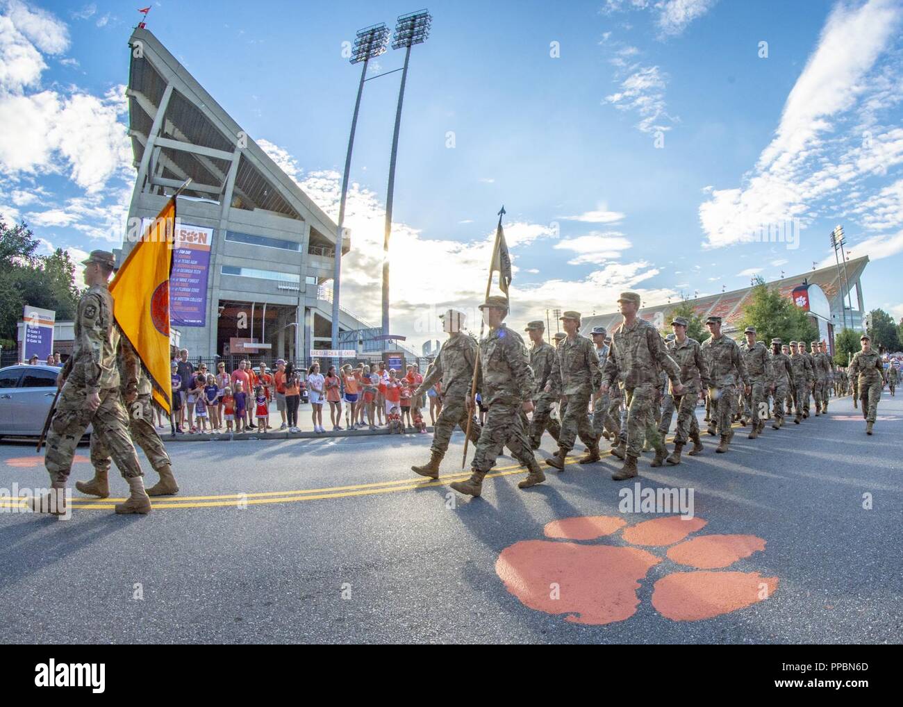 A formation of Clemson University Army ROTC cadets marches past Memorial Stadium during the 2018
