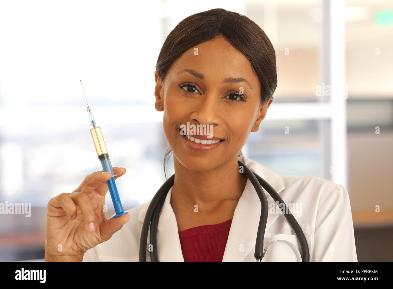 African nurse injection closeup hi-res stock photography and images - Alamy