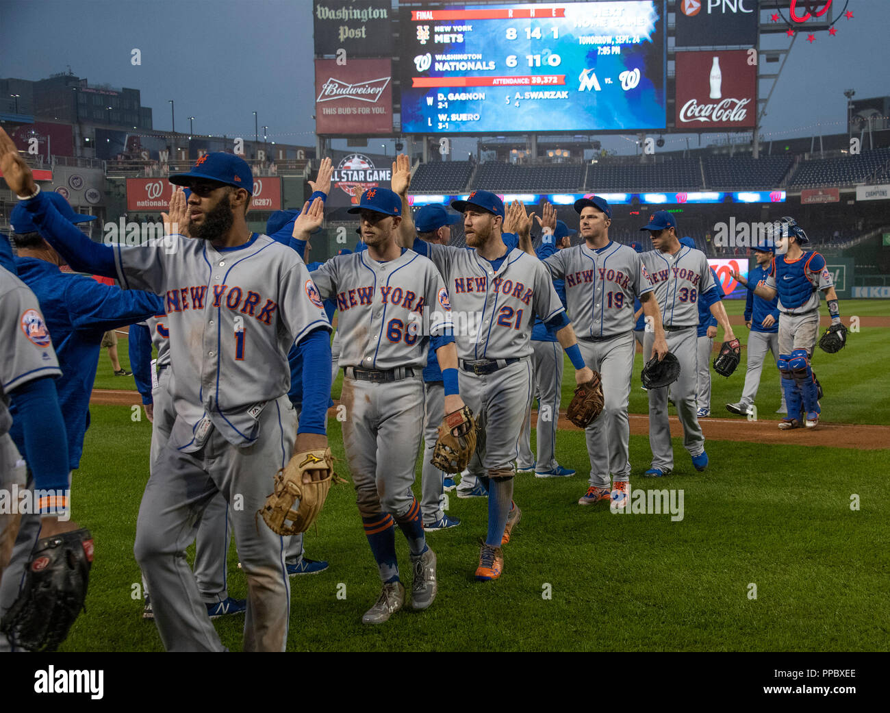 Washington, United States Of America. 23rd Sep, 2018. New York Mets celebrate their 8 - 6 victory over the Washington Nationals at Nationals Park in Washington, DC on Sunday, September 23, 2018. Credit: Ron Sachs/CNP (RESTRICTION: NO New York or New Jersey Newspapers or newspapers within a 75 mile radius of New York City) | usage worldwide Credit: dpa/Alamy Live News Stock Photo