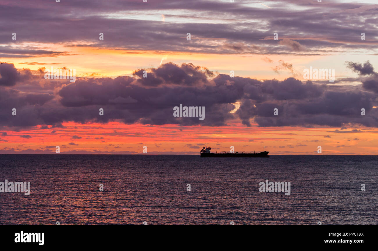 Fountainstown, Cork, Ireland. 25th September, 2018. Oil tanker Thun Gemini lies at anchor as dawn light breaks off Fountainstown, Co. Cork, Ireland. Credit: David Creedon/Alamy Live News Stock Photo
