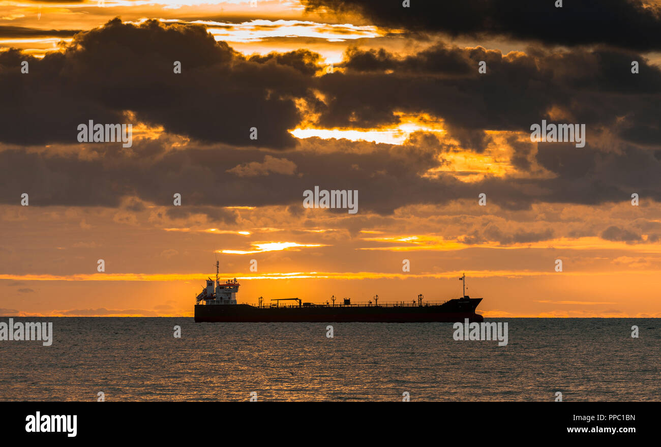 Fountainstown, Cork, Ireland. 25th September, 2018. Oil tanker Thun Gemini lies at anchor as dawn light breaks off Fountainstown, Co. Cork, Ireland. Credit: David Creedon/Alamy Live News Stock Photo