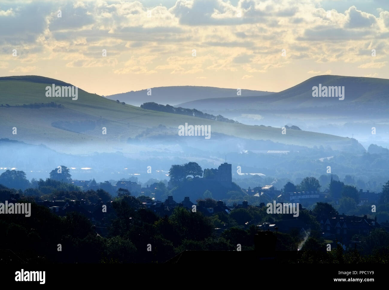 Lewes, East Sussex, UK. 25th September 2018. UK Weather: The imposing Lewes castle in the heart of the South Downs National Park, East Sussex, rising above the misty rooftops on a bright cold morning. © Peter Cripps/Alamy Live News Stock Photo