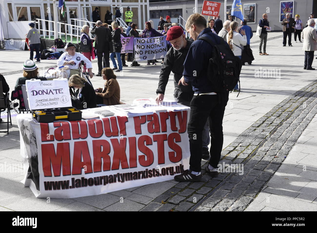 Liverpool, UK, 25th September 2018, Various stalls with flags and placards outside the Echo Arena for the Labour Party Conference. Credit David J Colbran / Alamy Live News Stock Photo