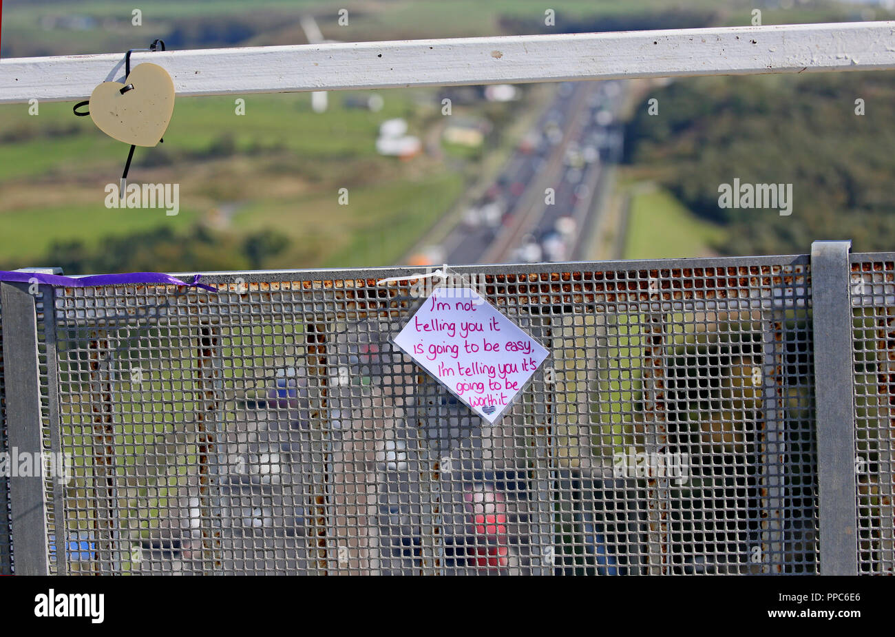 Barkisland, Calderdale, 25th September, 2018. Messages of support and contact details for the Samaritans are tied to a bridge in the hope of preventing someone from committing suicide by jumping from a bridge over the M62, Barkisland, Calderdale, 25th September, 2018 (C)Barbara Cook/Alamy Live News Stock Photo