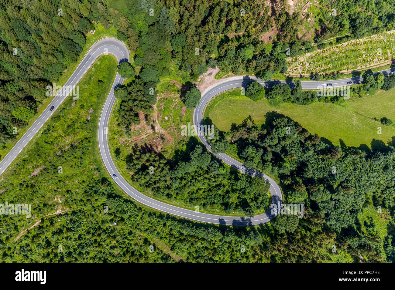 Aerial view, Winding road with hairpin bends, Am Bilstein, Highway L870, Brilon, Sauerland, North Rhine-Westphalia, Germany Stock Photo