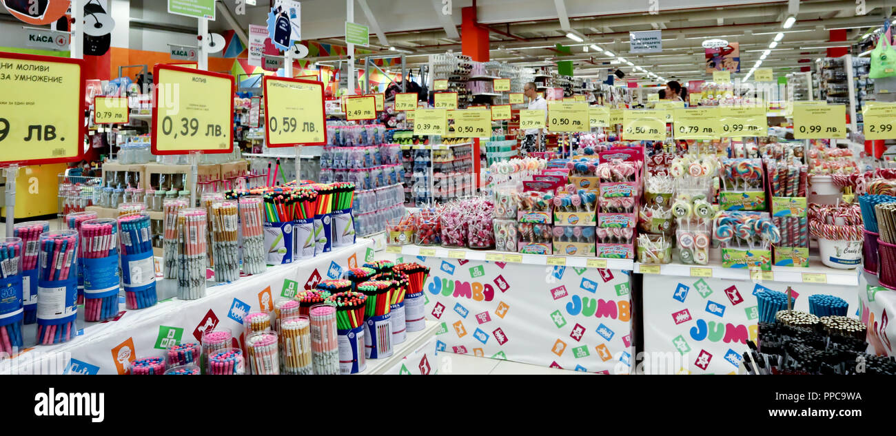 Sofia, Bulgaria, August 17, 2018: pencils, markers, candies, lollipops