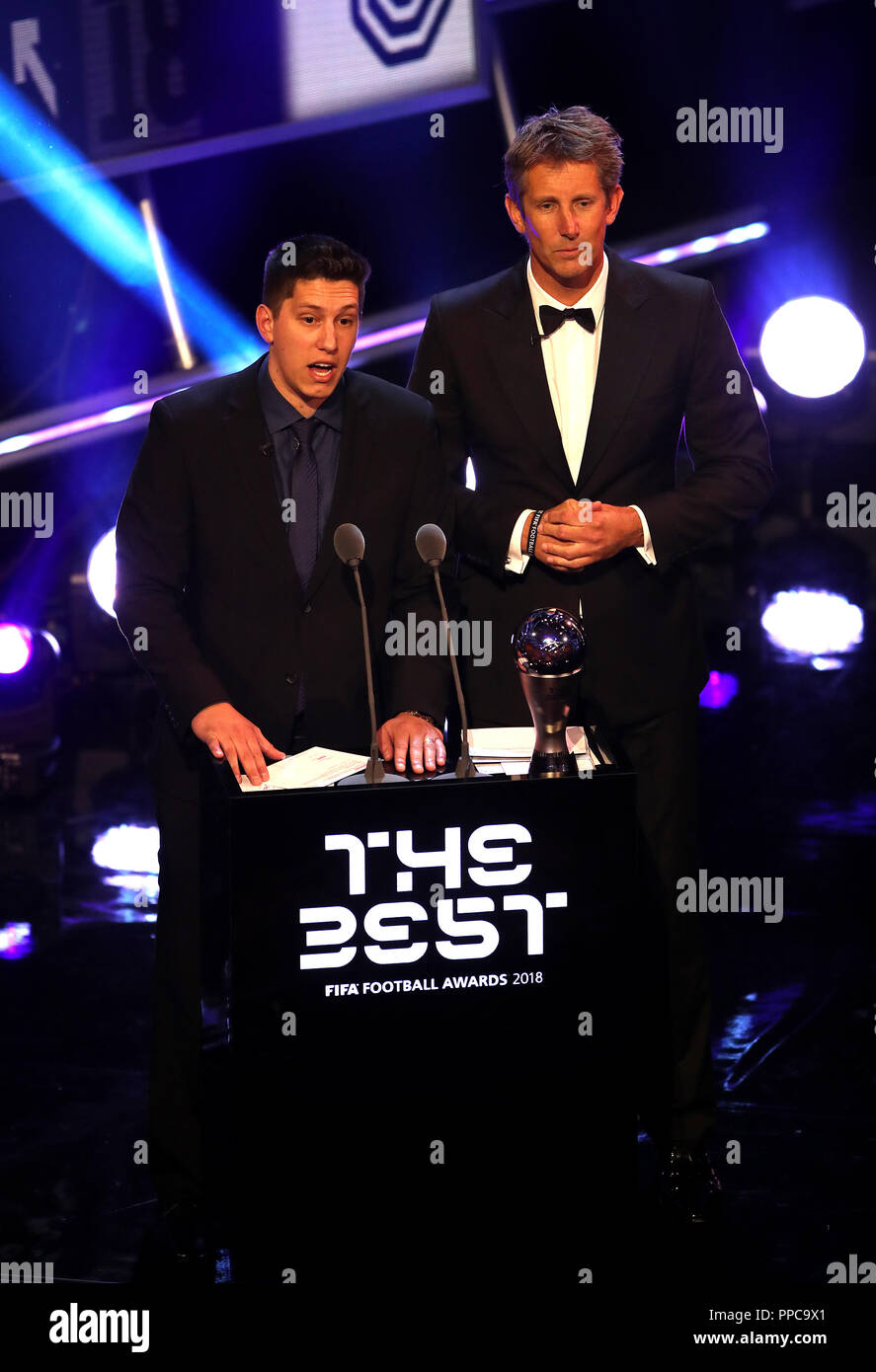 Edwin van der Sar (right) and Chapecoense crash survivor Jackson Follmann present the Best FIFA Goalkeeper Award during the Best FIFA football Awards 2018 at the Royal Festival Hall, London. PRESS ASSOCIATION Photo. Picture date: Monday September 24, 2018. See PA story soccer Awards. Photo credit should read: Tim Goode/PA Wire Stock Photo