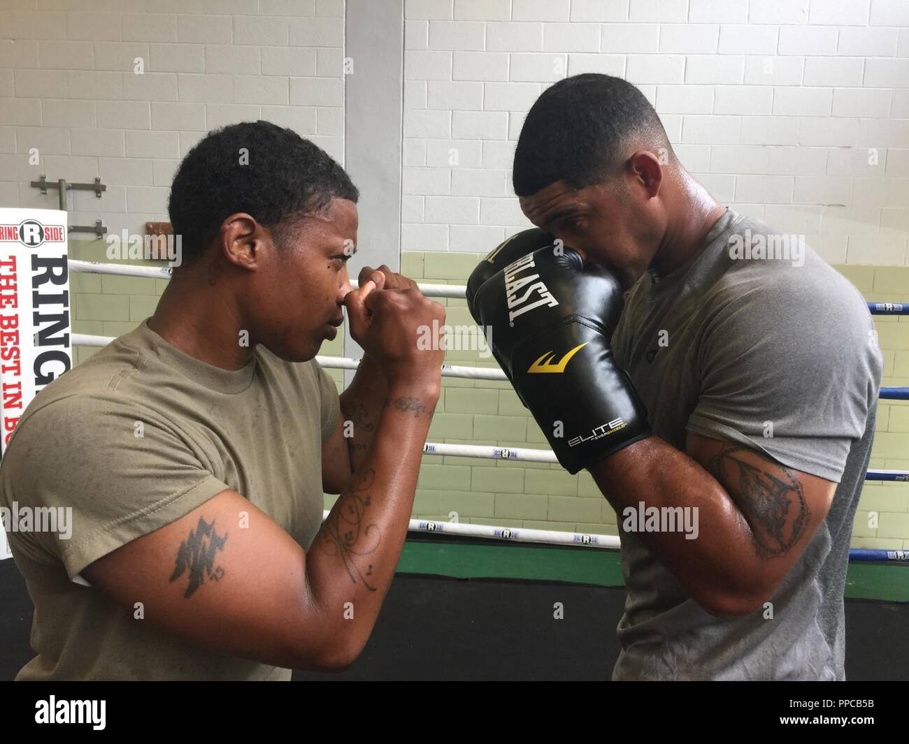 April Moreland-Beason, left, Marvin Carey and Marcus Dorval (not pictured) are headed to Fort Huachuca, Arizona, next week to try out for spots on the All-Army boxing team. Carey is looking for a spot on the team's roster as a fighter, Moreland-Beason a coach. Stock Photo