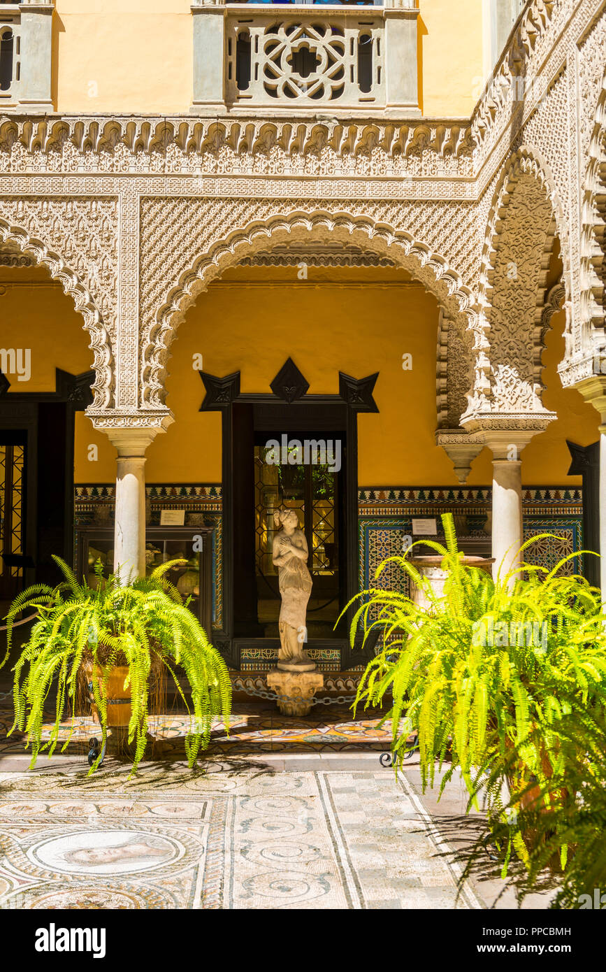 16th century palace, Moorish architecture, courtyard decorated with Roman mosaic, sculptures, Palacio de la Condesa de Lebrija Stock Photo