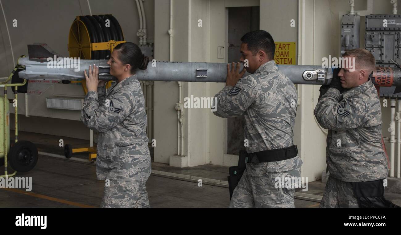 U.S. Air Force Senior Airman Victoria Barsness, left, 18th Maintenance ...