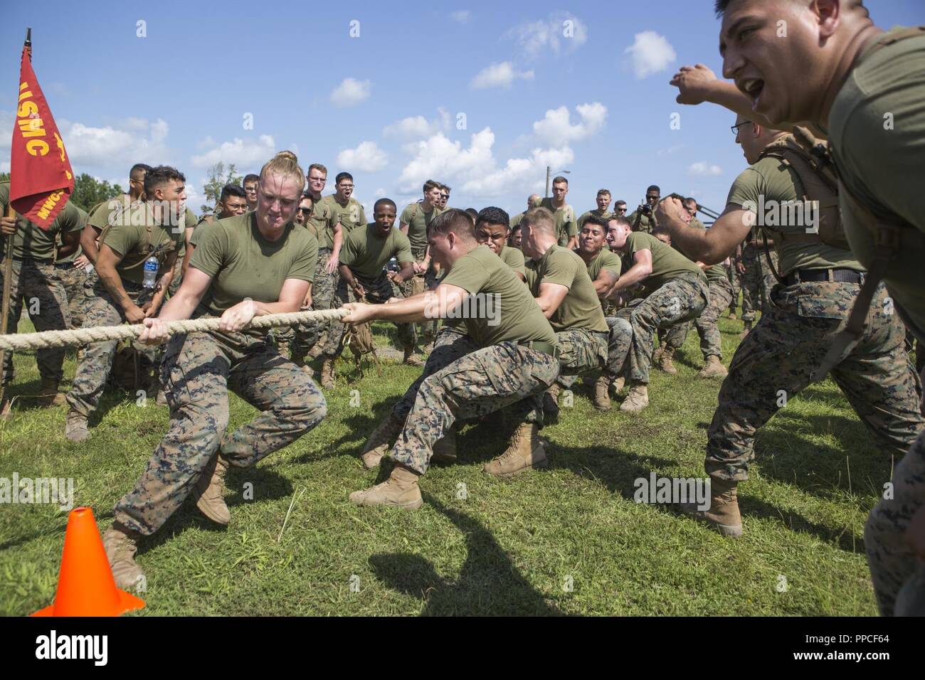 U.S. Marines with Marine Wing Communications Squadron (MWCS) 28, compete in a tug of war contest during the Spartan Cup at Marine Corps Air Station Cherry Point, N.C., Aug. 17, 2018. MWCS-28 conducts a semiannual Spartan Cup to raise moral and improve unit cohesion. MWCS-28 is with Marine Air Control Group 28, 2nd Marine Aircraft Wing. Stock Photo