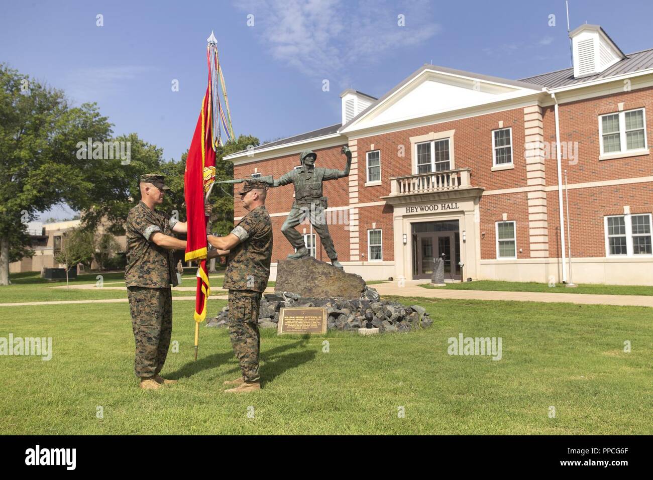 U.S. Marine Corps Lt. Col. Robert S. Peterson, left, outgoing