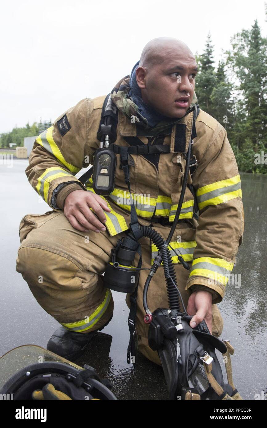 A U.S. Air Force Airman 1st Class Uhila Afungia, a fire protection ...