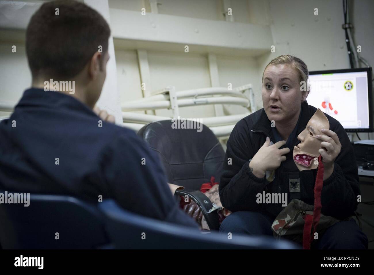 SEA (Aug. 29, 2018) Hospital Corpsman 3rd Class Kenzie Conard provides medical training aboard the Arleigh Burke-class guided-missile destroyer USS Carney (DDG 64) Aug. 29, 2018. Carney, forward-deployed to Rota, Spain, is on its fifth patrol in the U.S. 6th Fleet area of operations in support of regional allies and partners as well as U.S. national security interests in Europe and Africa. Stock Photo