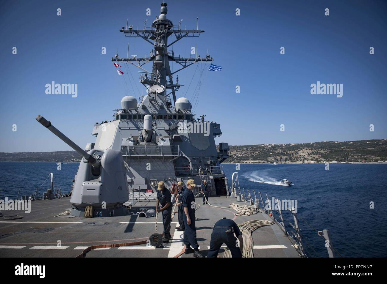 BAY, Greece (Sept. 2, 2018) The Arleigh Burke-class guided-missile destroyer USS Carney (DDG 64) departs Souda Bay, Greece, Sept. 2, 2018. Carney, forward-deployed to Rota, Spain, is on its fifth patrol in the U.S. 6th Fleet area of operations in support of regional allies and partners as well as U.S. national security interests in Europe and Africa. Stock Photo