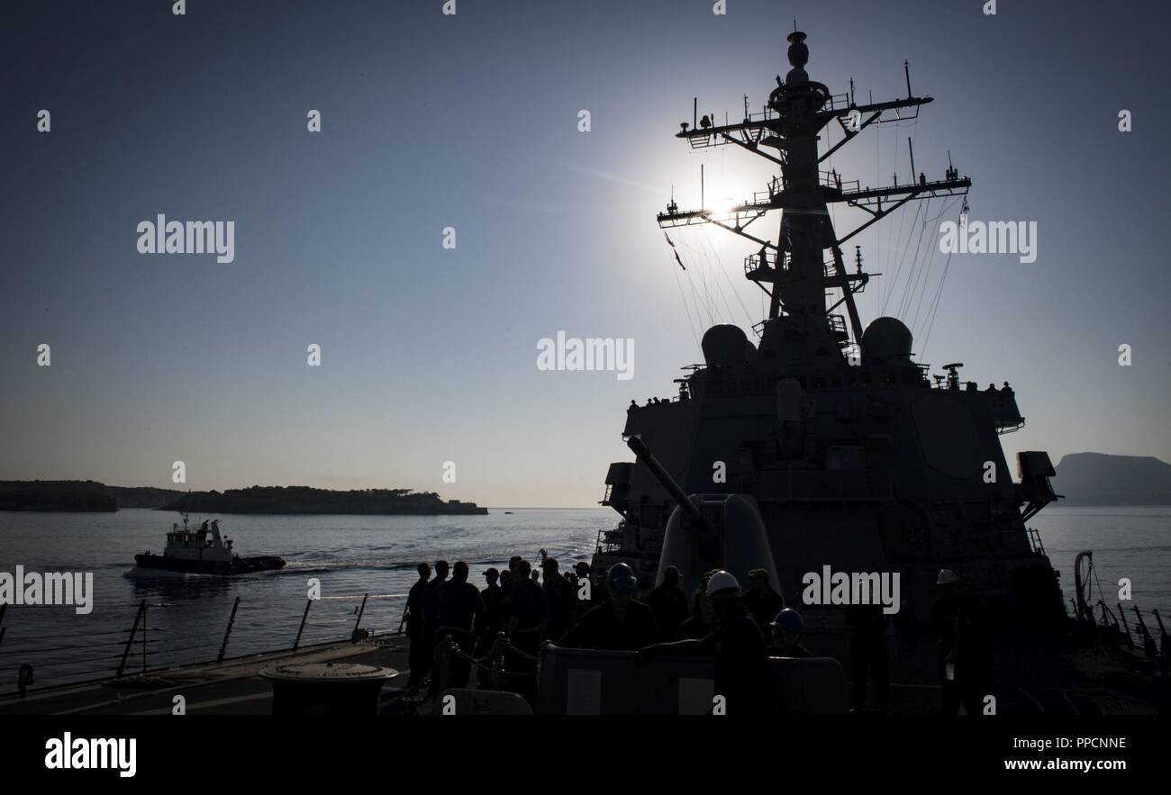 BAY, Greece (Sept. 2, 2018) The Arleigh Burke-class guided-missile destroyer USS Carney (DDG 64) arrives in Souda Bay, Greece, Sept. 2, 2018. Carney, forward-deployed to Rota, Spain, is on its fifth patrol in the U.S. 6th Fleet area of operations in support of regional allies and partners as well as U.S. national security interests in Europe and Africa. Stock Photo