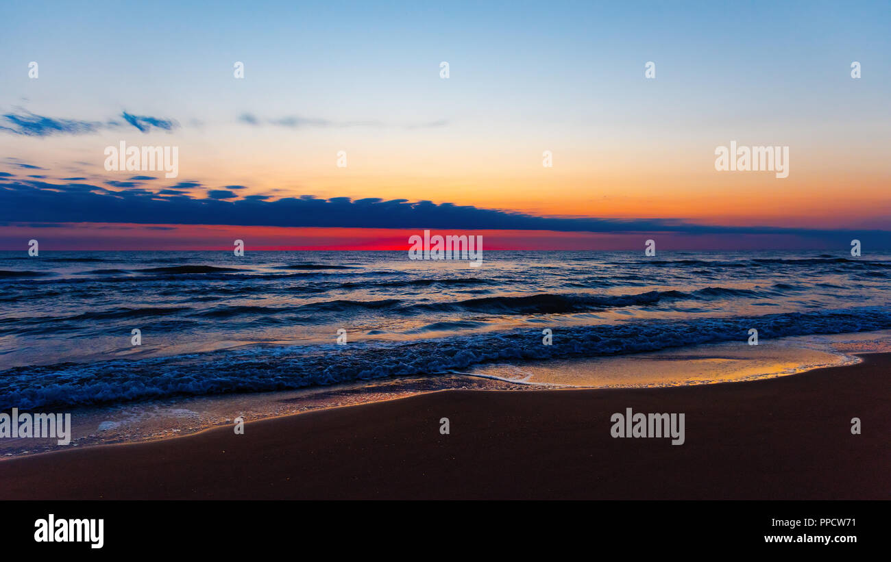 Amazing beautiful sunrise at the sea Stock Photo - Alamy