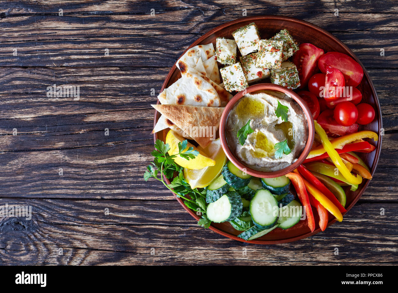 Traditional appetizer baba ganoush made from baked eggplant, lemon