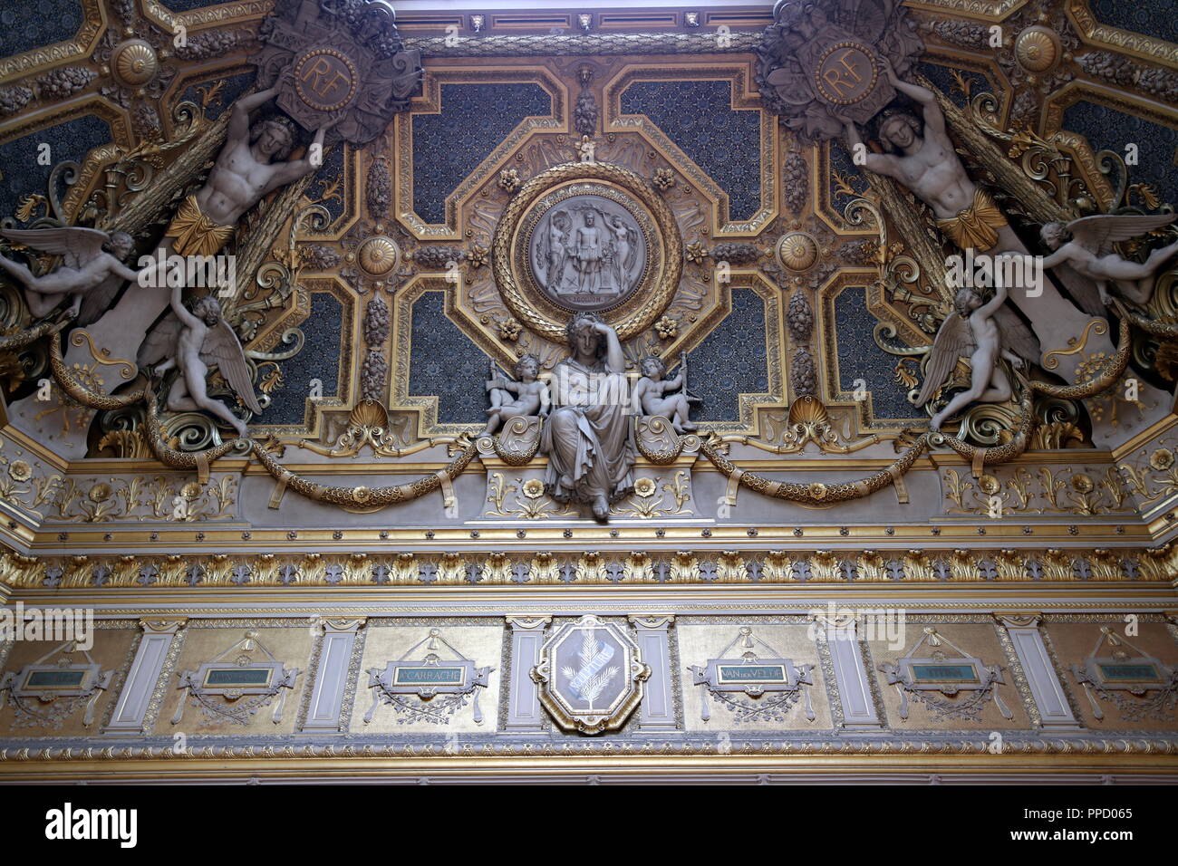 An ornate ceiling in The Louvre in Paris, France Stock Photo