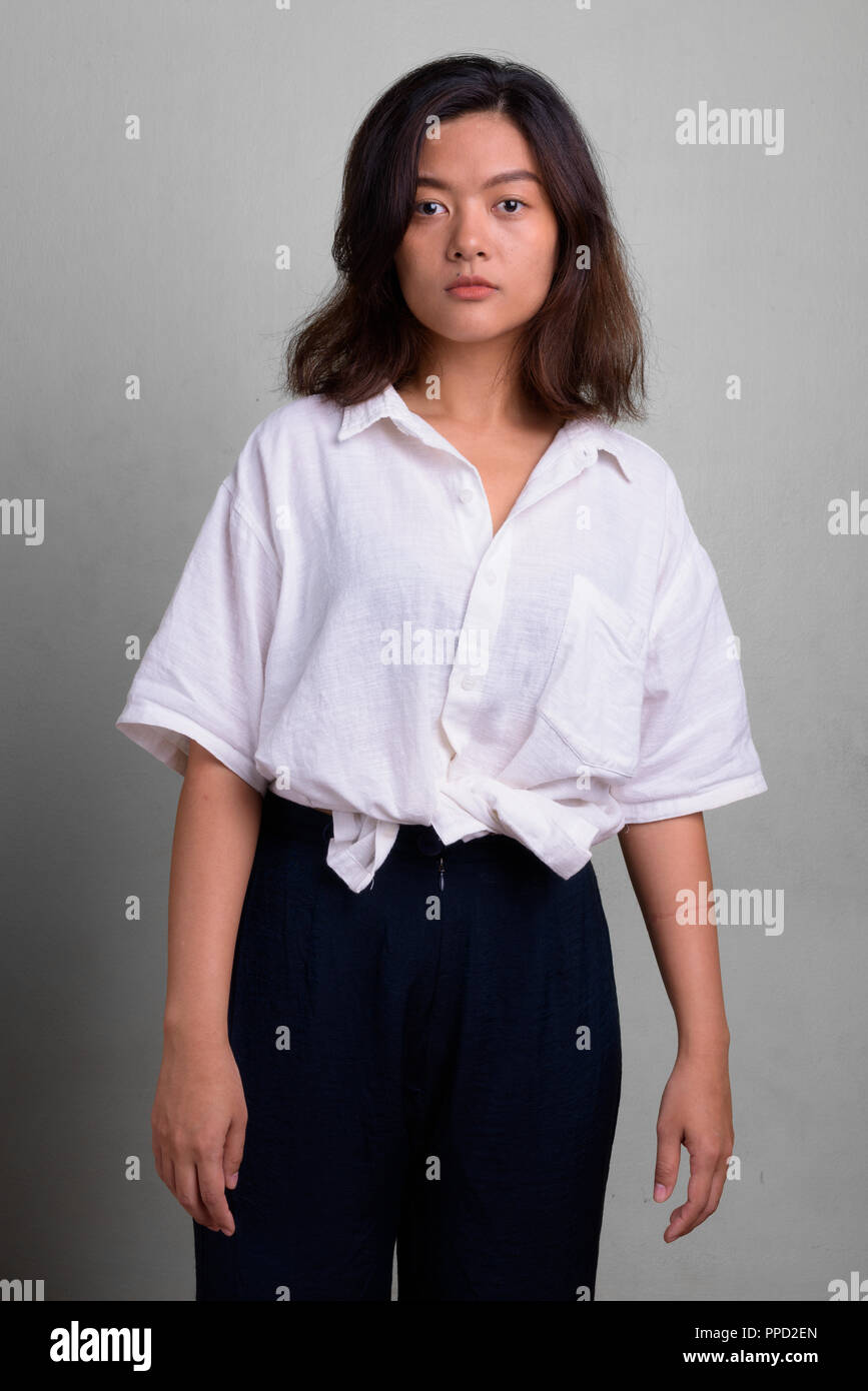 Portrait of young beautiful Asian woman with short hair Stock Photo - Alamy