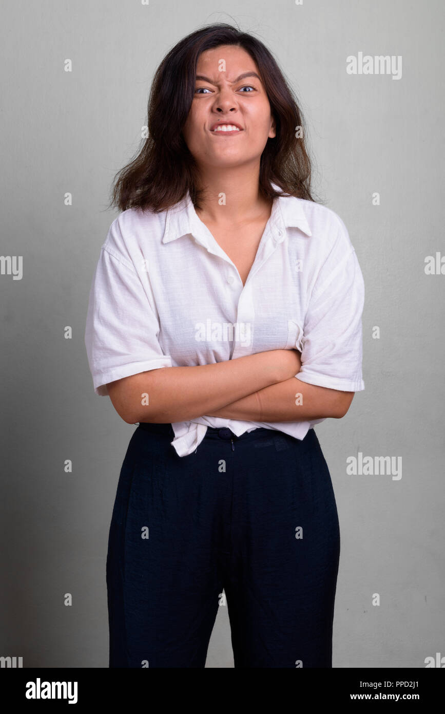 Portrait Of Young Beautiful Asian Woman With Short Hair Stock