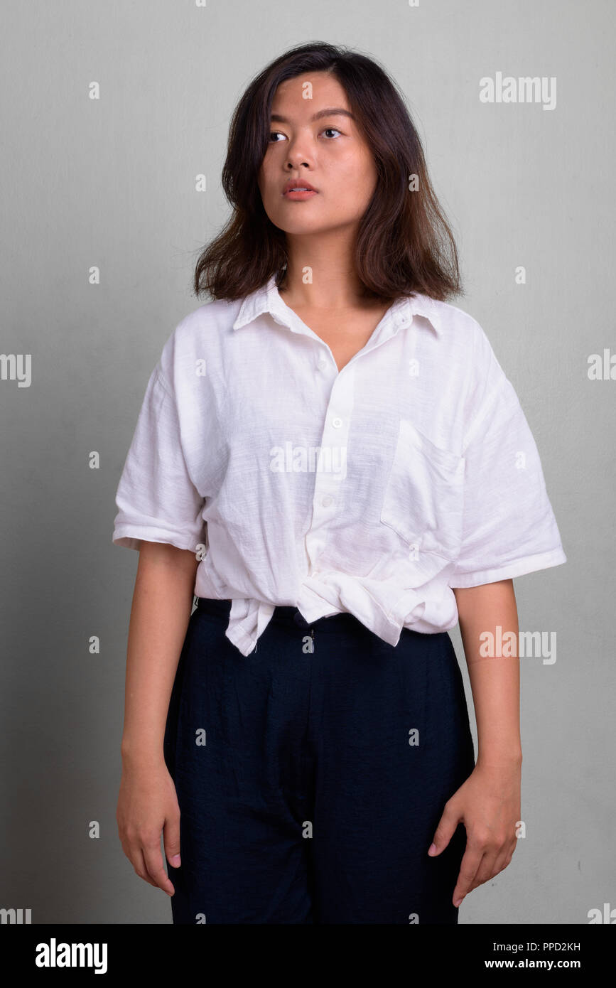 Portrait Of Young Beautiful Asian Woman With Short Hair Stock