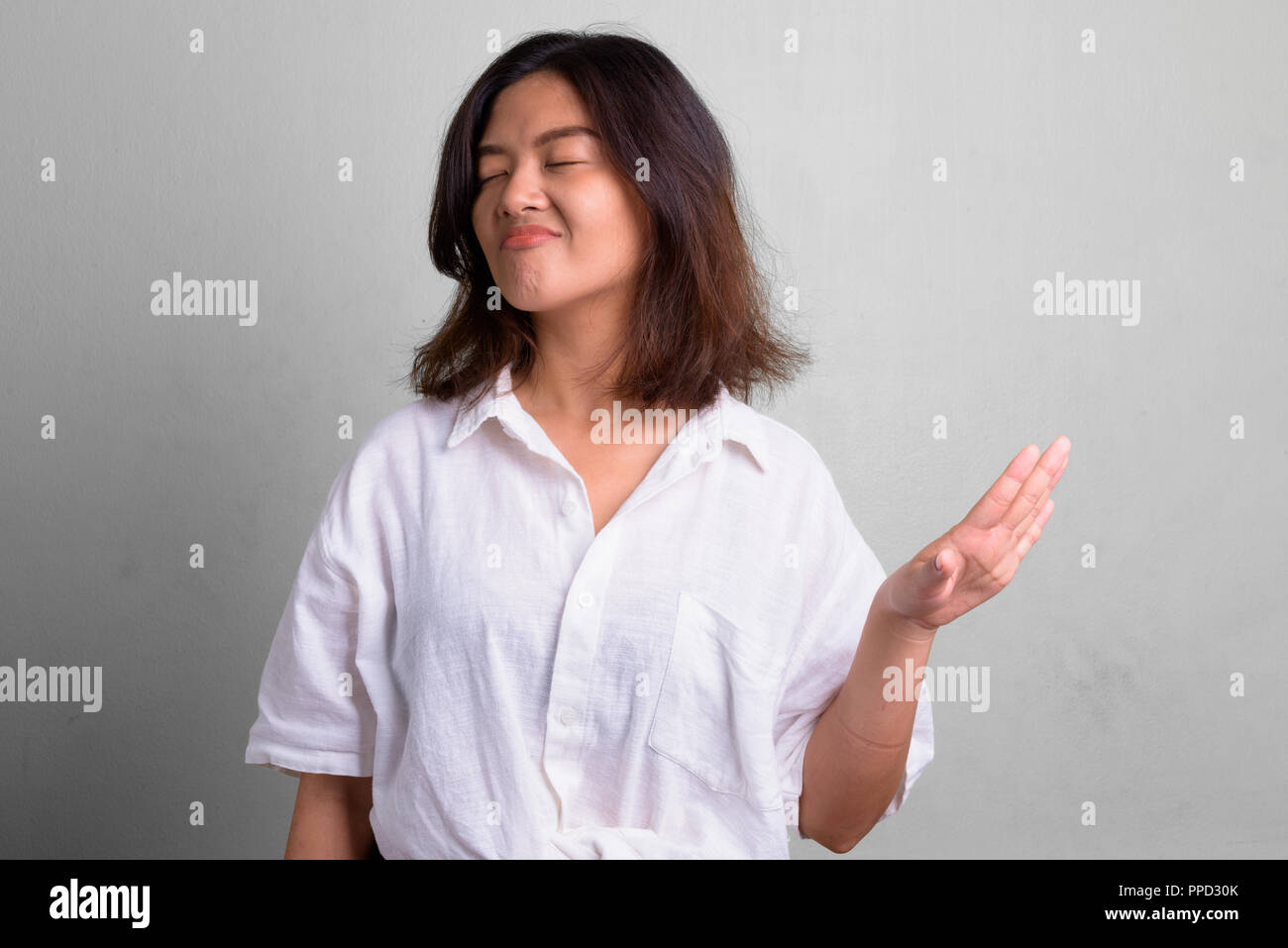 Portrait Of Young Beautiful Asian Woman With Short Hair Stock