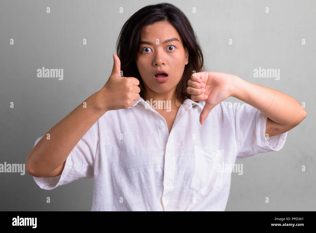 Portrait Of Young Beautiful Asian Woman With Short Hair Stock
