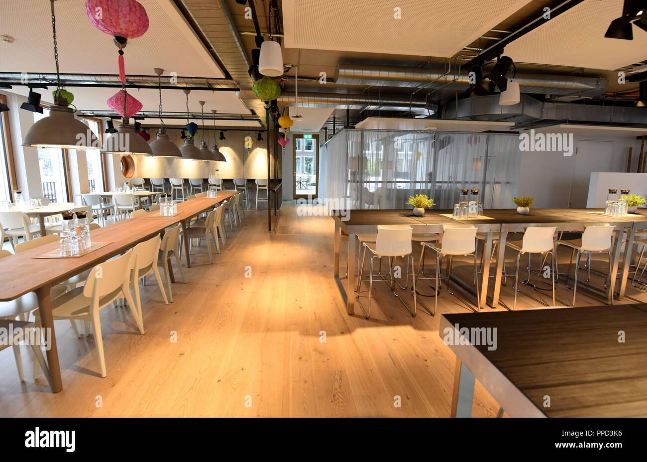 The canteen of Google in the Munich headquarters. Here, the staff can eat and drink for free. Stock Photo