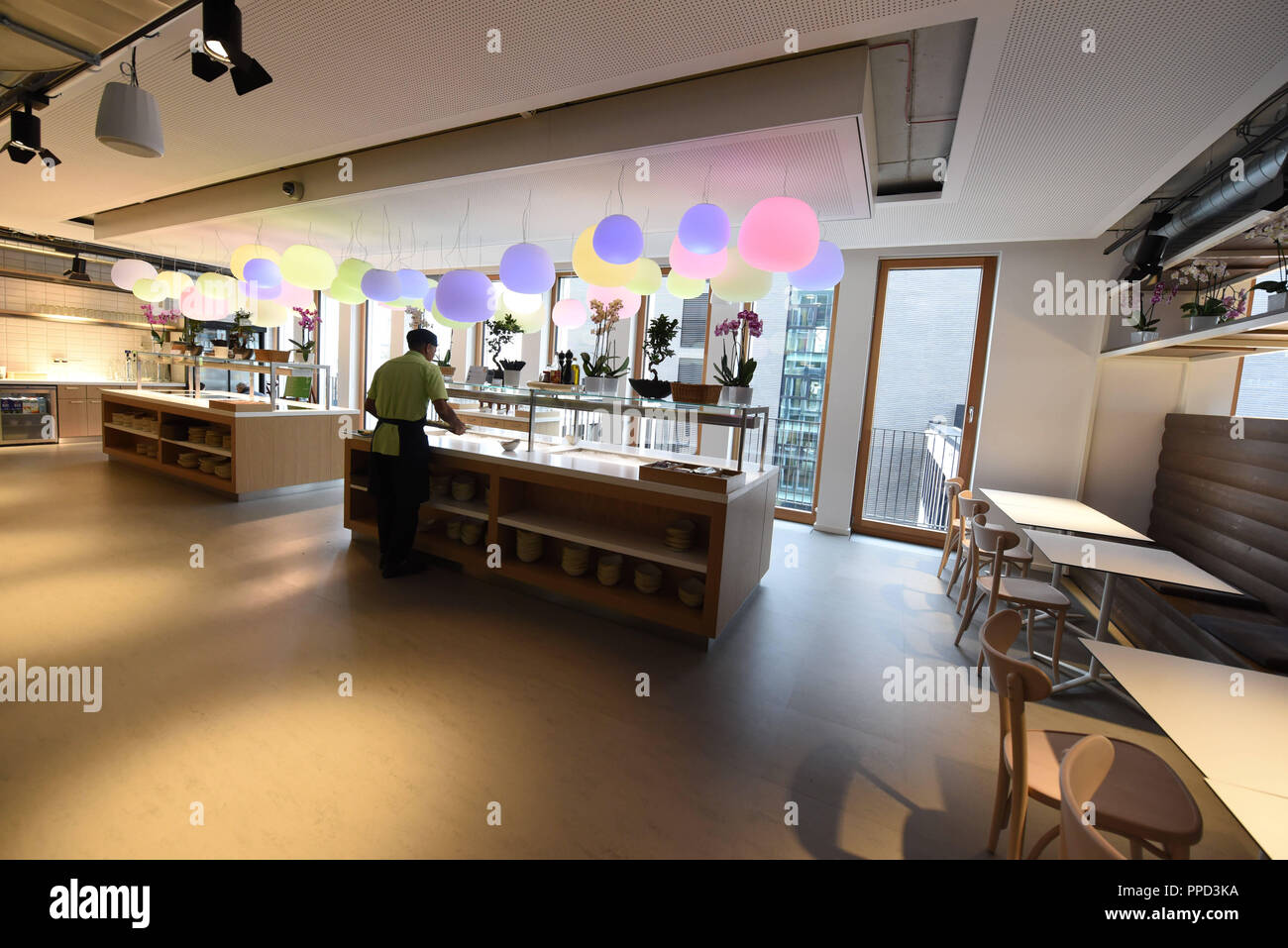 The cafeteria of Google in the Munich headquarters. Here, the staff can eat and drink for free. Stock Photo