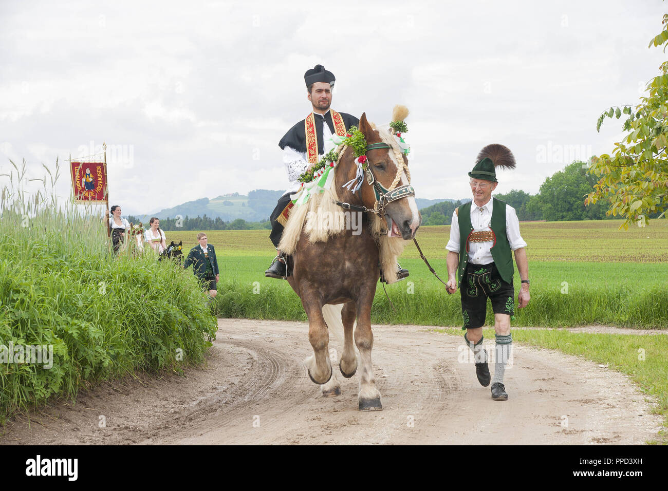 The traditional 'Leonhardiritt' in Holzhausen - Teisendorf, Oberbayern, Germany. During the parade which was first mentioned in 1612,  the beautifully dressed horses are being blessed. Stock Photo