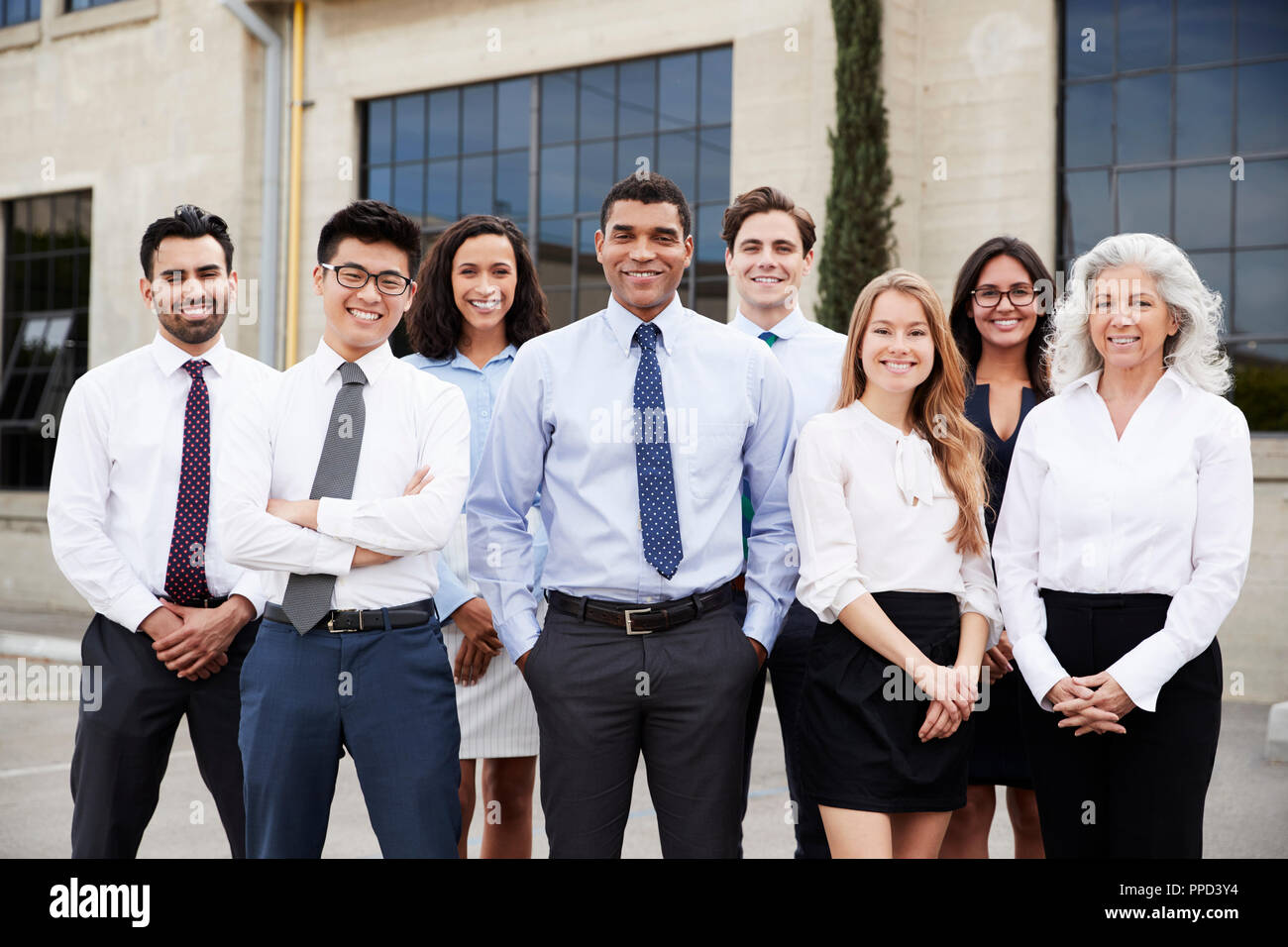 Mixed race businessman and colleagues outdoors, portrait Stock Photo