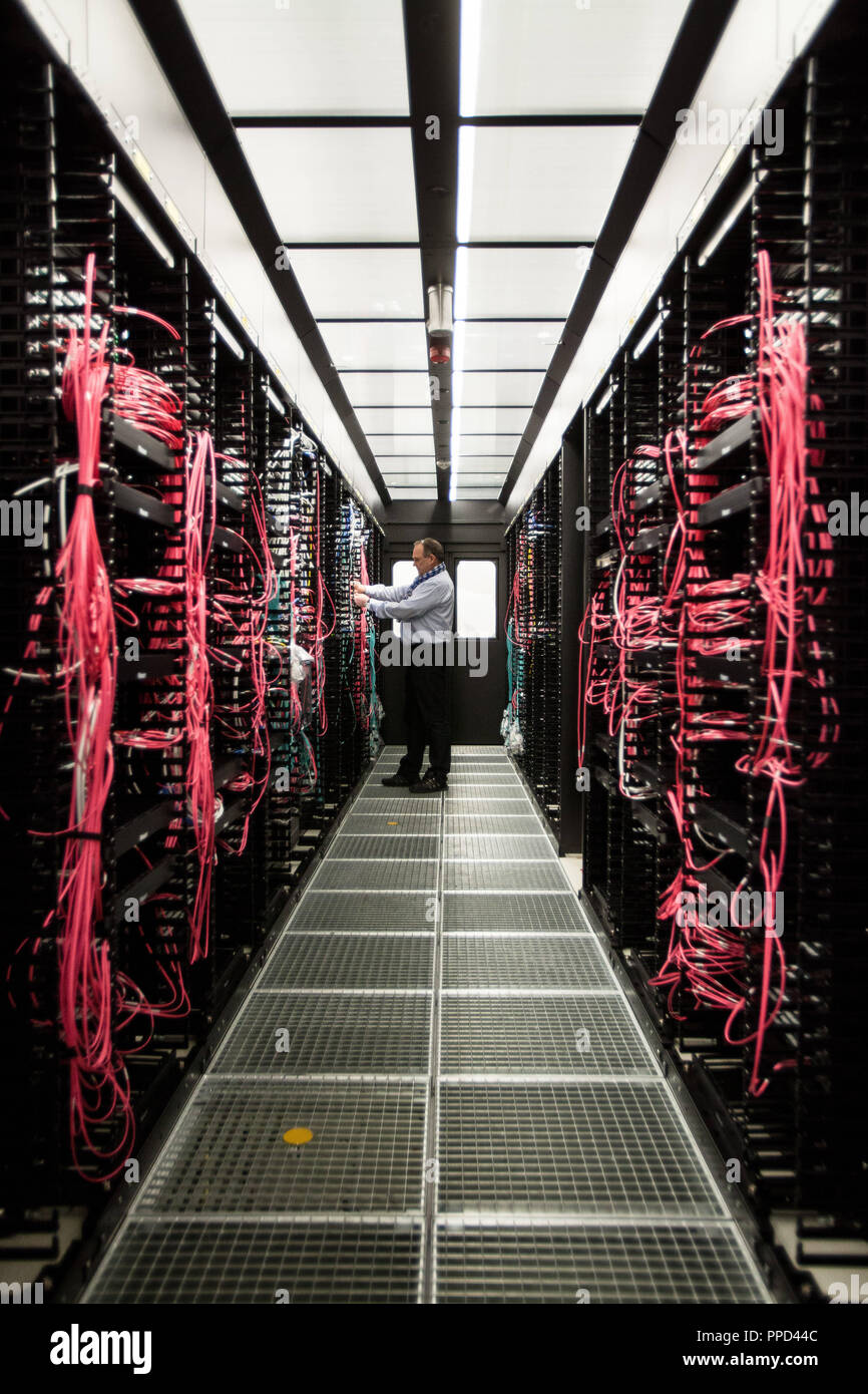 Cold aisle in the municipal data center. Stock Photo