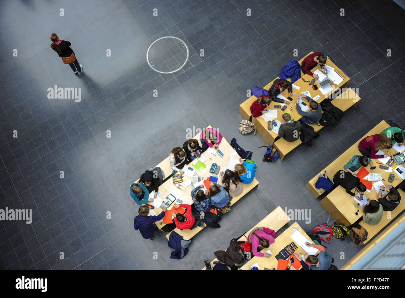 Day of Mathematics at the TU Campus Garching: in the image students are solving arithmetic problems in the building of the Faculty of Mathematics. Stock Photo