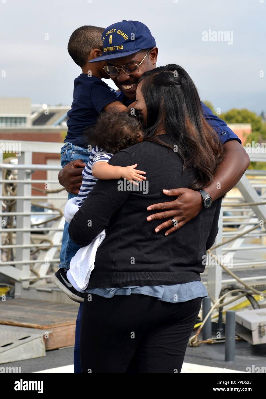 Family and friends met aboard the Coast Guard Cutter Bertholf's flight deck to reunite with Bertholf crewmembers following the cutter's return home to Alameda, Calif., after a 90-day deployment, Sept. 4, 2018. Bertholf is one of four 418-foot National Security Cutters homeported in Alameda. Stock Photo