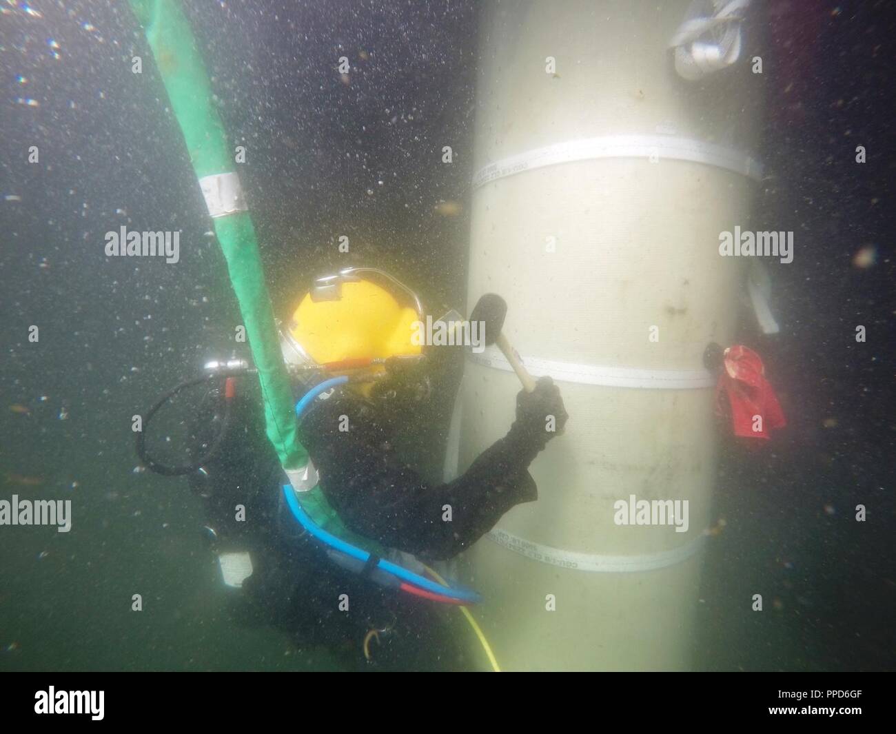 U.S. Navy Construction Electrician 2nd Class Gregory Lewis, assigned to