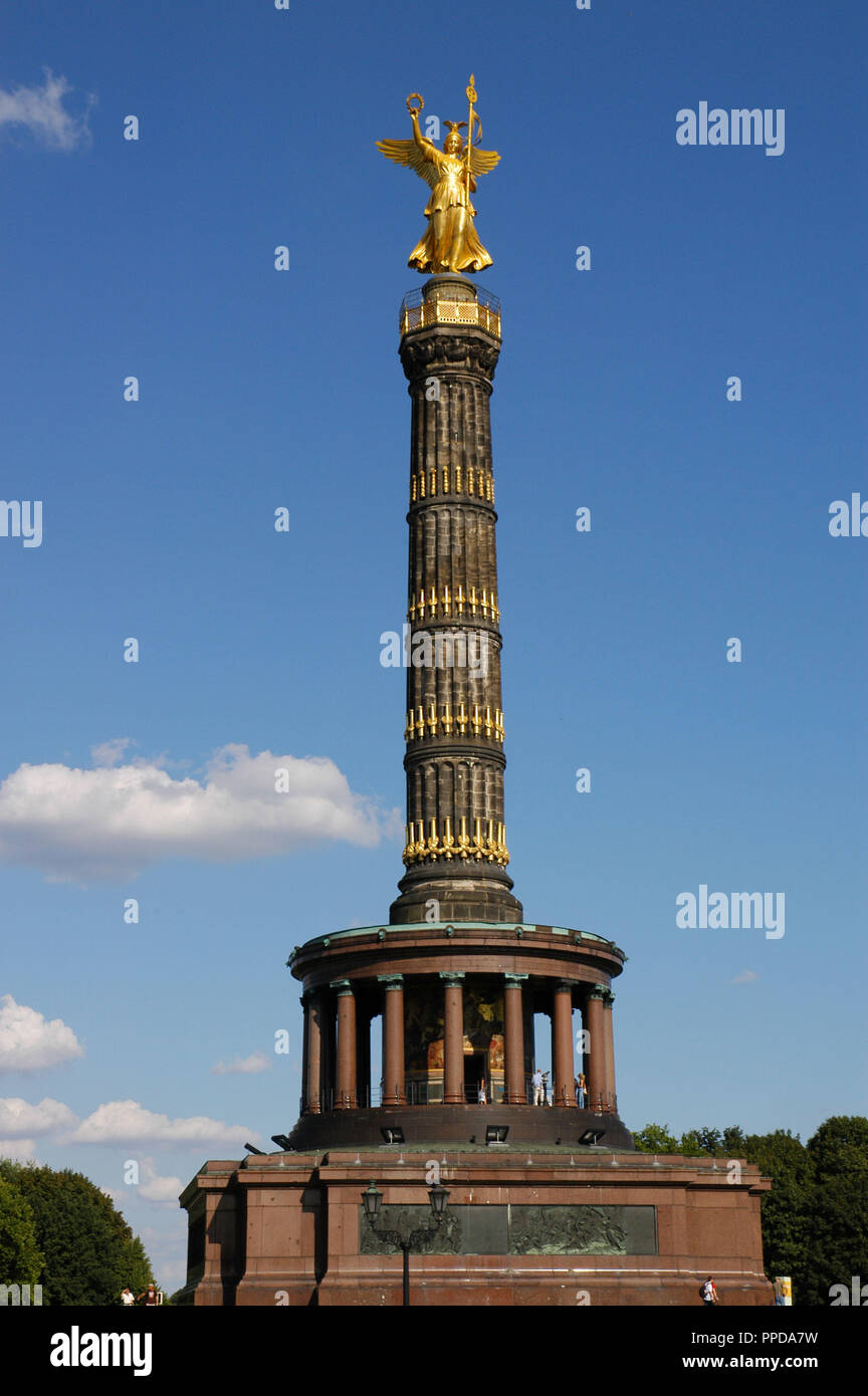 Germany. Berlin Victory Column. Designed by the German architect Heinrich Strack (1805-1880), after 1864. It commemorates the Prussian victory in the Danish-Prussian War although, as the monument was inaugurated in 1873, Prussia has also victorious in the Austro-Prussian War and in the Franco-Prussian War. On the top, is a bronze sculpture of Victoria, designed by the German sculptor Friedrich Drake (1805-1882). Tiergarten Park. Stock Photo