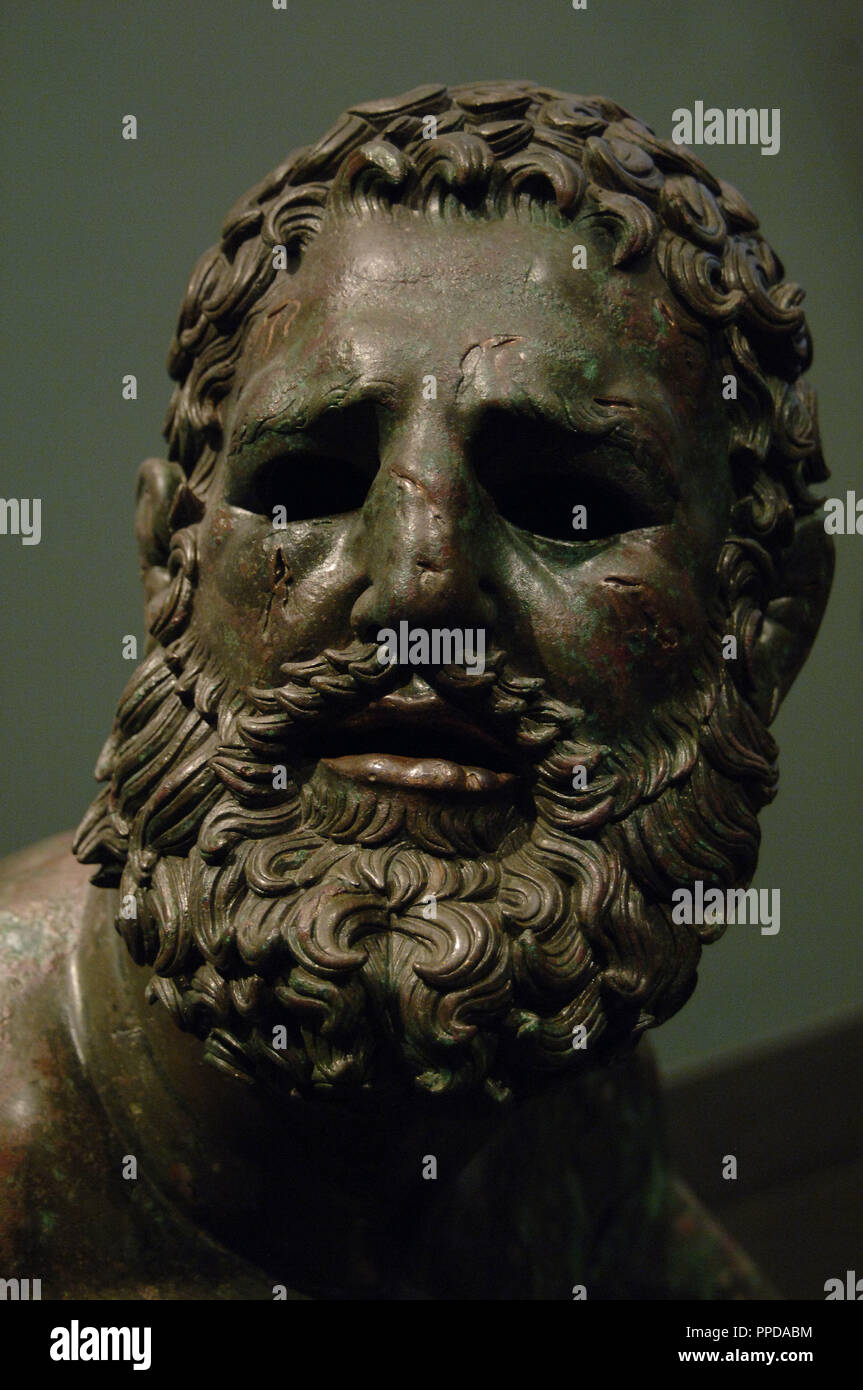 Greek Art. Hellenistic. Boxer of Quirinal or the Terme Boxer. Bronze sculpture of the Hellenistic period (1st century B.C.). Boxer sitting at rest, with metal and leather dressings used for combat. Palazzo Massimo. National Roman Museum. Rome. italy. Stock Photo
