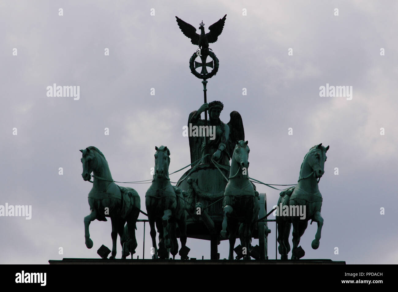 Quadriga, chariot drawn by four horses driven by Victoria Goddess. Copy by the original of 1793, by Johann Gottfried Schadow (1764-1850). Brandenburg Gate. Berlin. Germany. Stock Photo