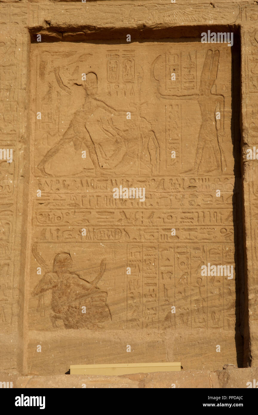 Egyptian art. Great Temple of Ramses II. 19th Dynasty. The pharaoh Ramses II offering war prisoners to god Amun. 19th Dynasty. New Kingdom. Abu Simbel. Egypt. Stock Photo