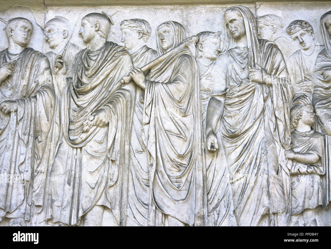 Ara Pacis Augustae. Altar dedicated to Peace, the Roman goddes. Frieze.  Procession on south side. Augustus with his cape pulled over his head, Rex  sacorum (high priest), four figures (priests), lictor (with