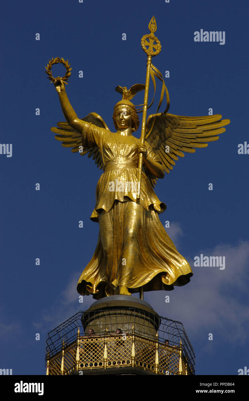 Germany. Berlin. Bronze sculpture of Victoria, designed by the German sculptor Friedrich Drake (1805-1882), on the top of the Victory Column, wich was designed to commemorate the Prussian victories in the Danish-Prussian War, Austro-Prussian War and in the Franco-Prussian War. Tiergarten Park. Stock Photo