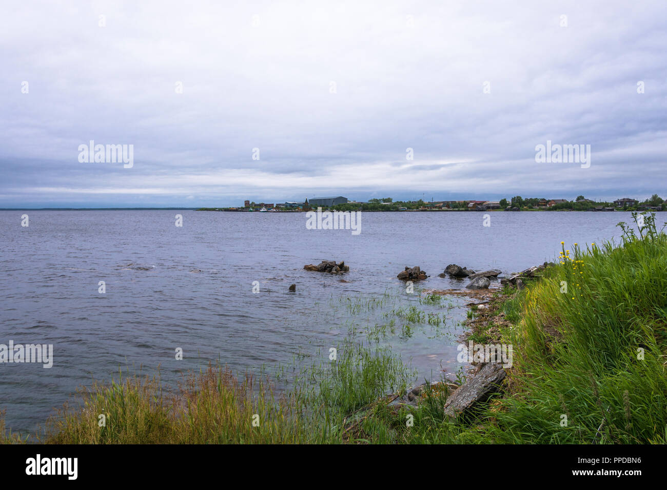 View of the village Rabocheostrovsk in the summer cloudy day, Karelia, Russia. Stock Photo