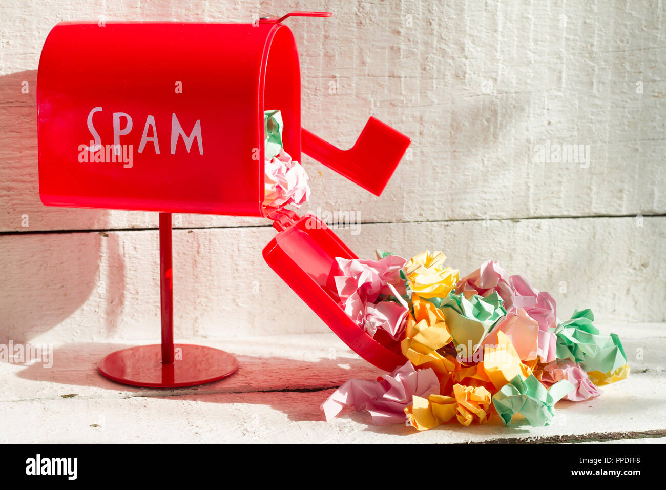 Full red mailbox of spam problem abstract on white background Stock Photo