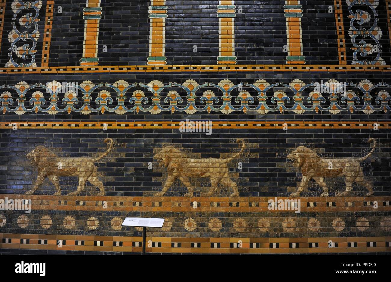 Mesopotamian art. Neo-Babylonian. The Throne Room of Nebuchadnezzar II.  Reconstructed facade. Dated in 580 . Its 56 meters facade was decorated  with colored glazed bricks as shows the composition, including stylized  palms.
