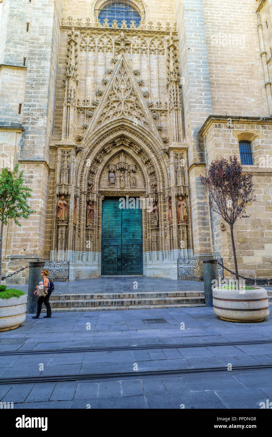 Door of Assumption or Main Door of the Cathedral of Saint Mary of the See (Catedral de Santa Maria de la Sede), or Seville Cathedral, Seville Stock Photo