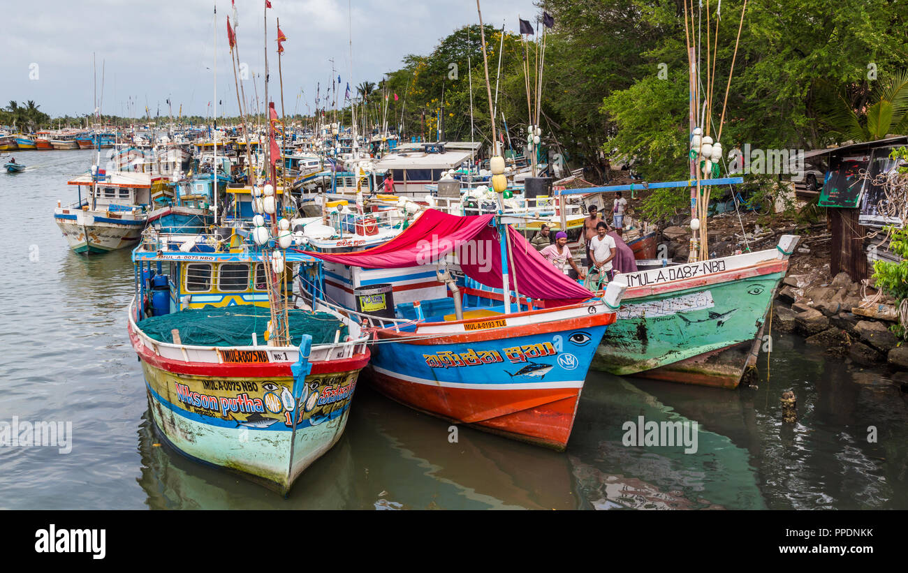 Negombo Sri Lanka July 24 2017 - Colorful fishing boats in the harbor of Negombo Stock Photo