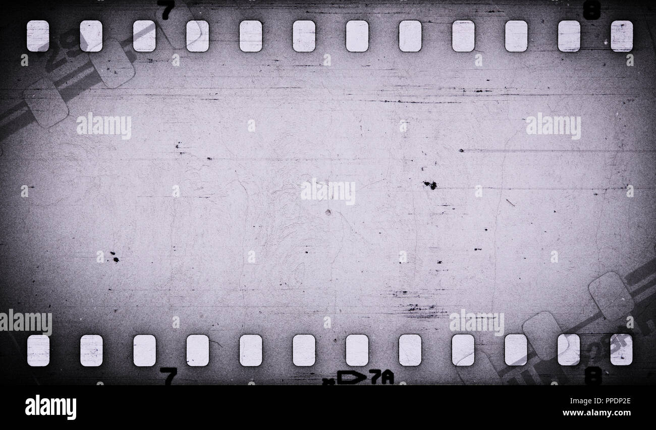 Grunge gray scratched dirty film strip background. Stock Photo