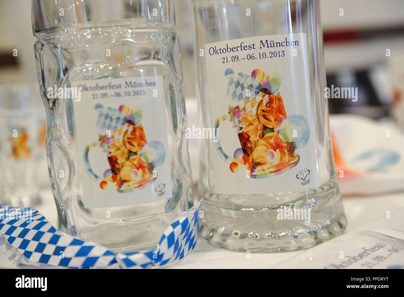 Two beer mugs designed for the Oktoberfest 2013, pictured at a press conference for the Oktoberfest in the Munich Stadtmuseum. Stock Photo